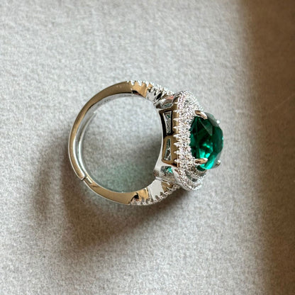 https://blingupp.com/products/elegant-emerald-and-cubic-zurconia-adjustable-ring