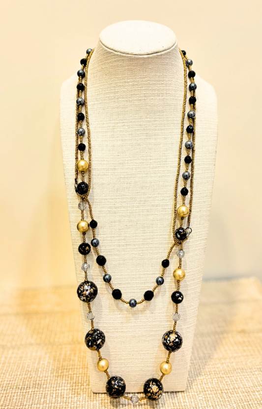 https://blingupp.com/products/black-golden-beads